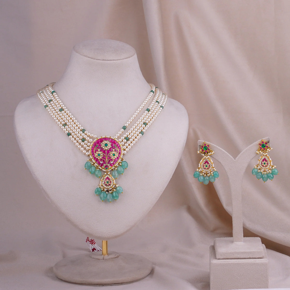 Pink and green stone necklace set with pearls and matching earrings, traditional Indian jewelry